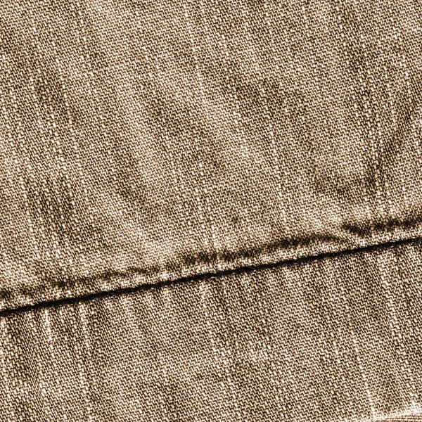 Brown denim texture,decoraited with a seam — Stock Photo, Image