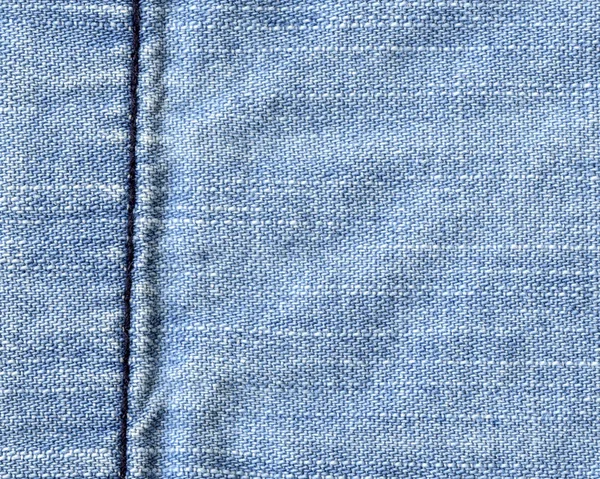 Blue denim texture,decoraited with a seam — Stock Photo, Image