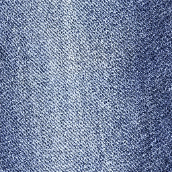 Светло-голубая текстура джинсы в качестве фона — стоковое фото