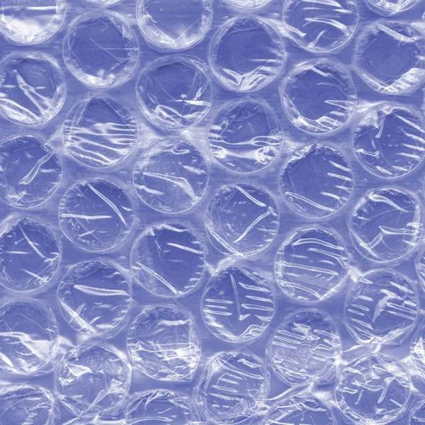 Текстура голубого целлофанового упаковочного материала — стоковое фото