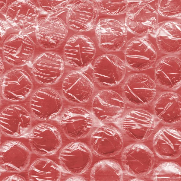 Rode textuur van cellofaan verpakkingsmateriaal geschilderd — Stockfoto