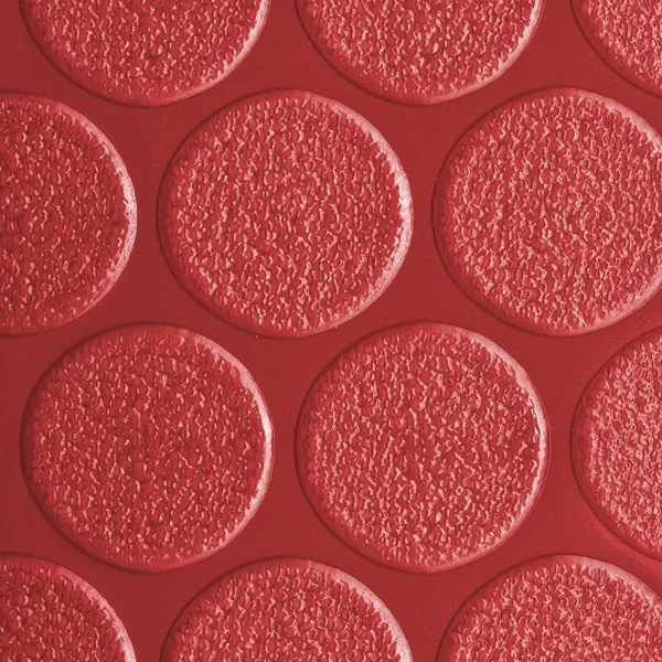 Ljust röd linoleum textur, användbar för bakgrund — Stockfoto
