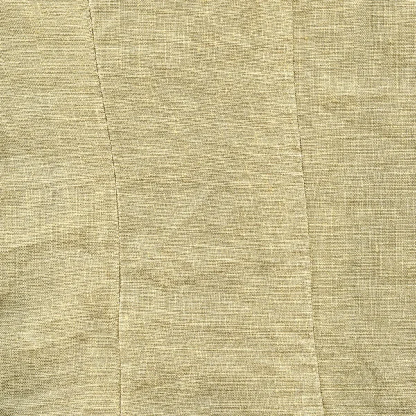 Fragment av beige säckväv väska som bakgrund — Stockfoto
