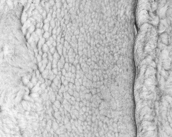 Frammento di scolorito collo di pelliccia artificiale come sfondo — Foto Stock