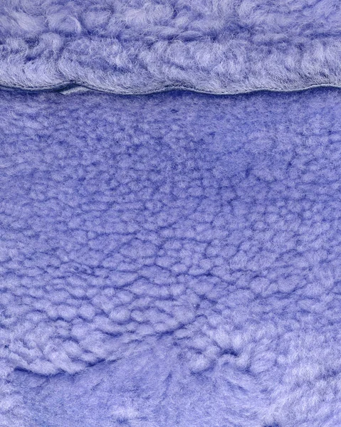 Fragment of blue artificial fur collar as background — Stock Photo, Image