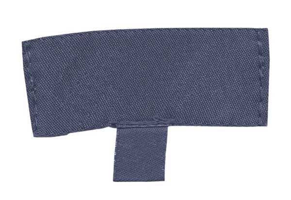 Stare etykiety pusty niebieski włókienniczych na białym tle — Zdjęcie stockowe