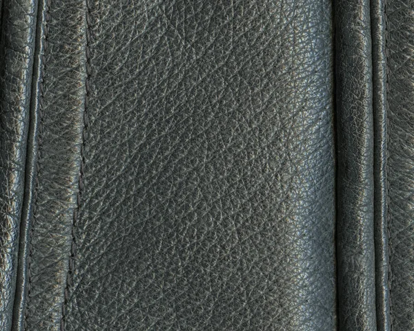 Fragment of leather coat as black leather background — Stock Photo, Image