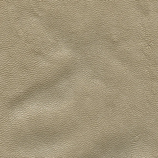 Light beige crumpled leatherette texture closeup — Stock Photo, Image