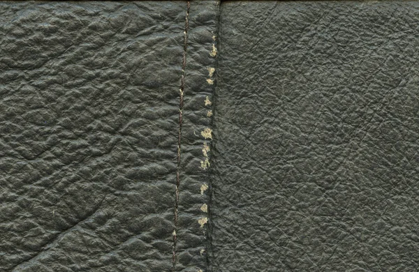 eski yıpranmış koyu yeşil deri doku closeup, dikiş