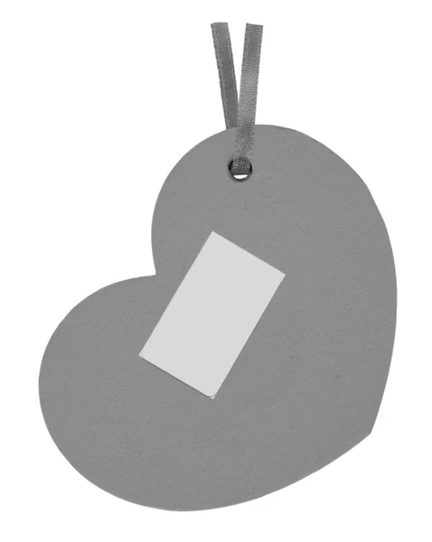 Gray cardboard tag in shape of the heart  isolated on white — Stock Photo, Image