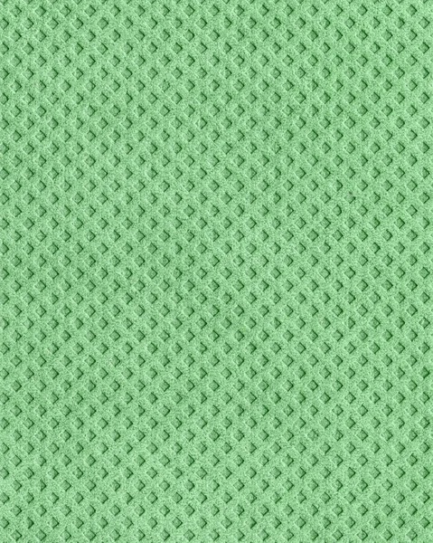 Licht groene synthetische materiaal textuur als achtergrond — Stockfoto