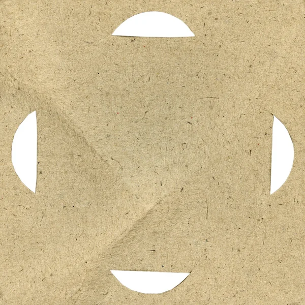 Cardboard texture, perforation — Stock Photo, Image