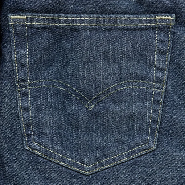 Zadní kapsy kalhot, modré džíny — Stock fotografie