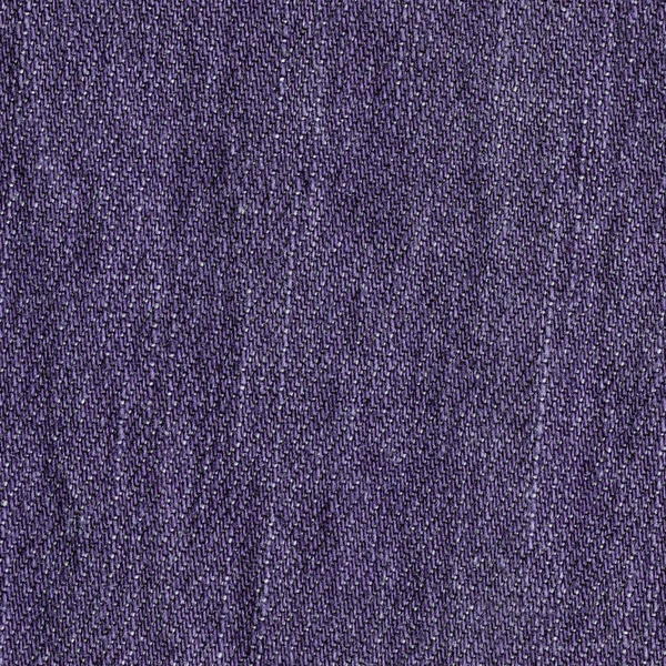 Фиолетовая текстура джинсы в качестве фона для дизайнерских работ — стоковое фото