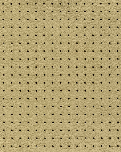 Background of yellow perforated leather — Stock Photo, Image