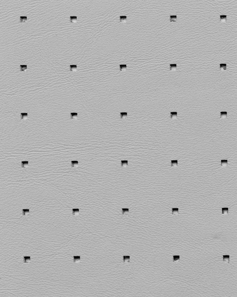 Textura de couro artificial perfurada cinza — Fotografia de Stock