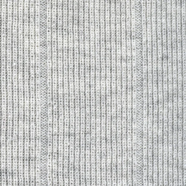 Текстура белого трикотажа в качестве фона — стоковое фото
