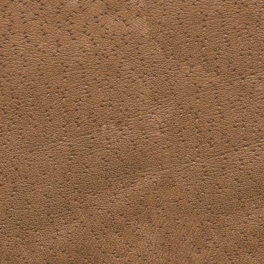 kahverengi delikli deri doku tasarım çalışmaları için arka plan olarak