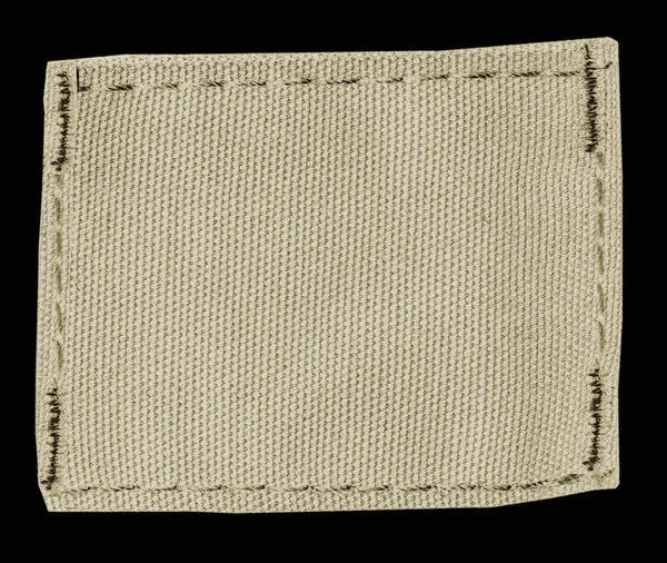 Étiquette Textile Vierge Beige Isolée Sur Fond Noir — Photo