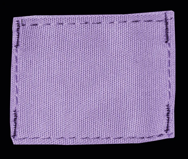 Licht Violet Leeg Textiel Label Geïsoleerd Zwarte Achtergrond — Stockfoto