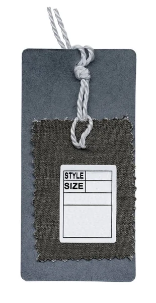 Etiqueta de cartão com uma amostra de tecido — Fotografia de Stock