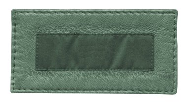 beyaz izole boş yeşil deri ve tekstil etiket