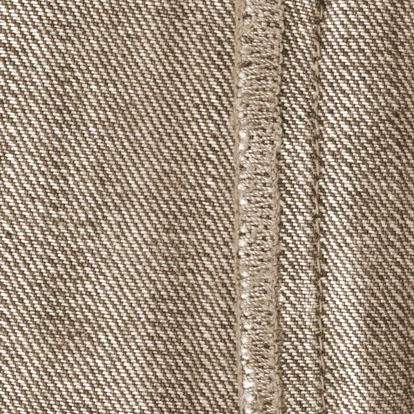 Ett fragment av undersidan av bruna jeans byxor — Stockfoto