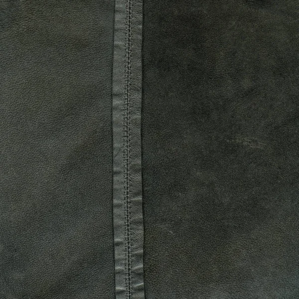 Fundo de couro preto, uma costura — Fotografia de Stock
