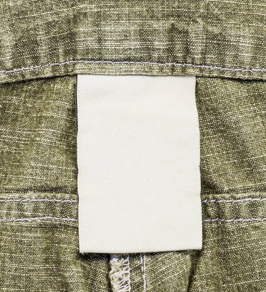 Leere Weiße Stoffanhänger Auf Grau Grünem Jeanshintergrund Nützlich Für Ihren — Stockfoto
