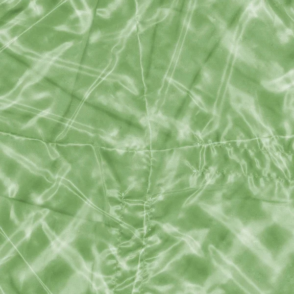绿色皱巴巴的合成纺织背景 — 图库照片