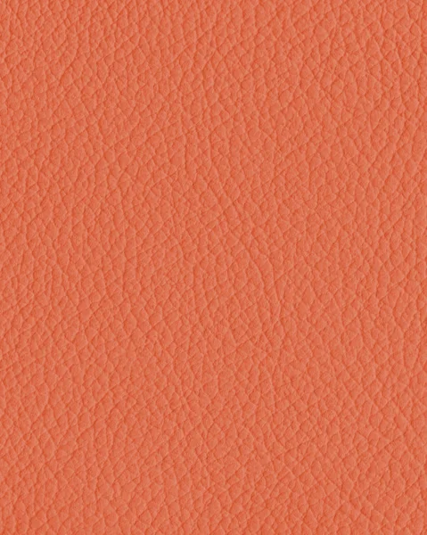 Textura de couro laranja close-up como fundo — Fotografia de Stock