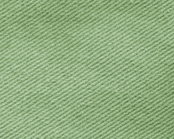 Zelené textilie textura pozadí — Stock fotografie