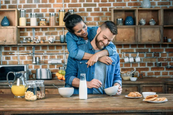 Young couple having breakfast — Stock Photo, Image