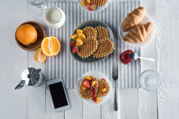 Fresh tasty breakfast with waffles 