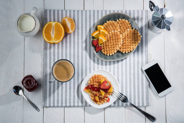 Fresh tasty breakfast with waffles 