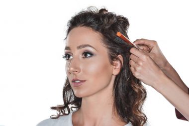 hair dresser doing hairstyle clipart