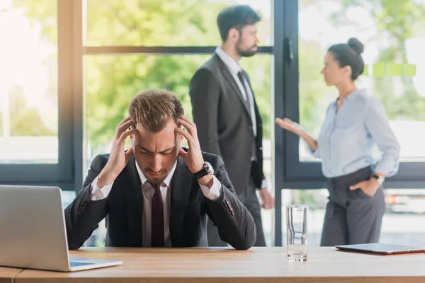 Overworked businessman at workplace — Stock Photo, Image