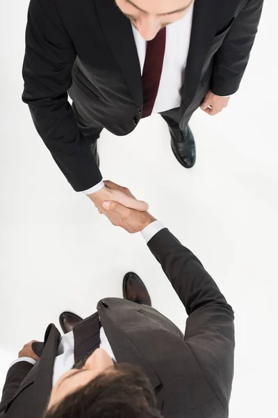 Zakenmensen schudden elkaar de hand — Stockfoto