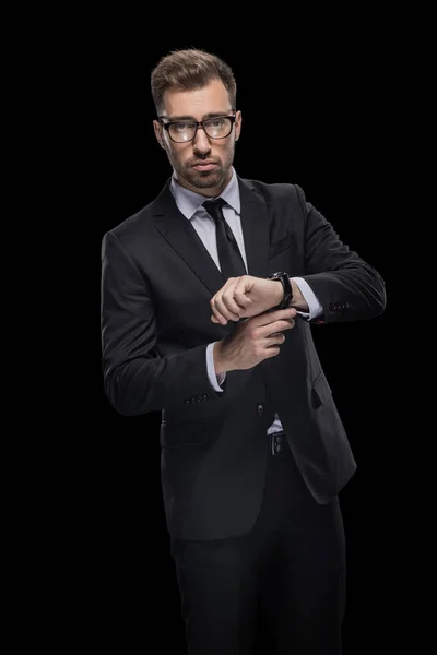 Hombre de negocios seguro con reloj — Foto de Stock