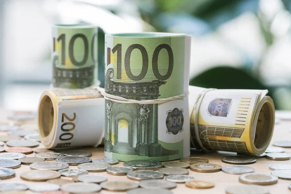 Euro banknotes and coins — Stock Photo, Image