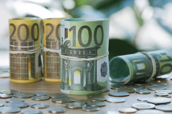 Euro banknotes and coins — Stock Photo, Image