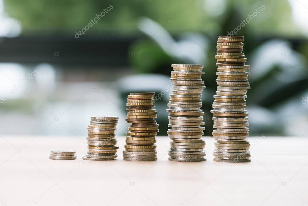 stacks of coins on table