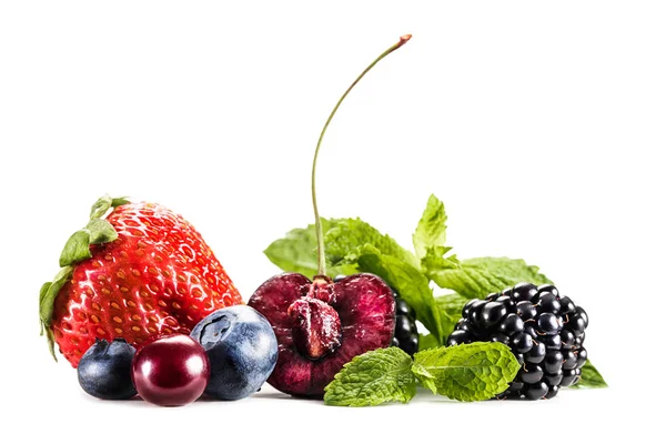 Assorted berries and mint leaves — Stock Photo, Image