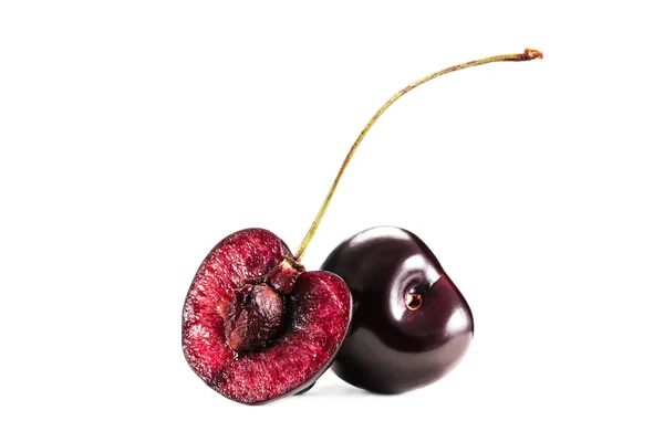 Whole and half cherry berries — Stock Photo, Image