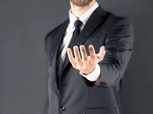 Businessman with open hand — Stock Photo, Image