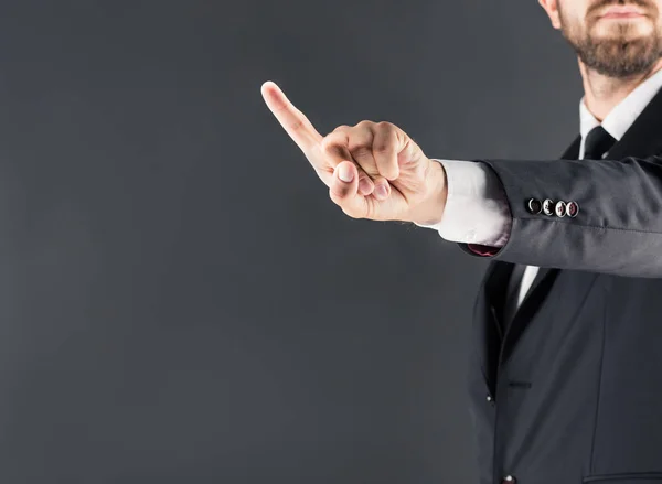 Businessman pointing with finger — Stock Photo, Image