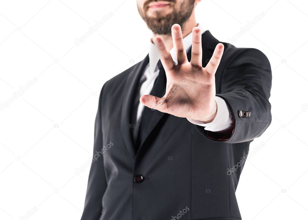 businessman showing stop symbol