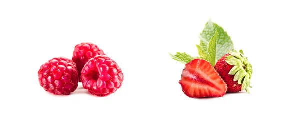 Piles of raspberries and strawberries — Stock Photo, Image