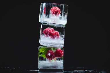 raspberries frozen in ice cubes clipart