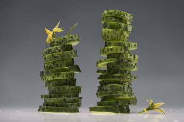 two stacks of sliced cucumbers clipart